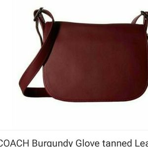 Coach burgundy saddle bag
